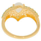 Back view of a luxurious Pear White Opal Sterling Silver Ring showcasing intricate detailing and green accents.